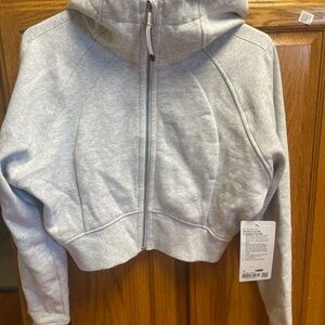 Lululemon size 10 girls cropped jacket. NWT. Smoke free